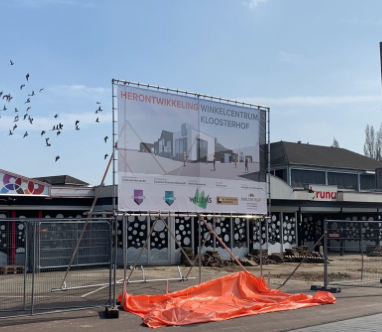 Onthulling bouwbord
